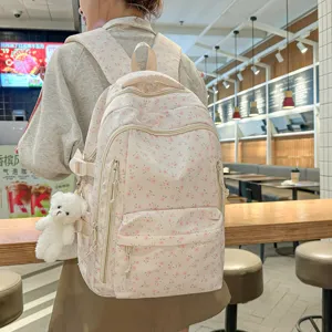 Cute floral school backpack for women, lightweight canvas casual daypack for college students.
