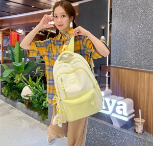 Cute college student casual backpack, large capacity lightweight school bag for daily use.