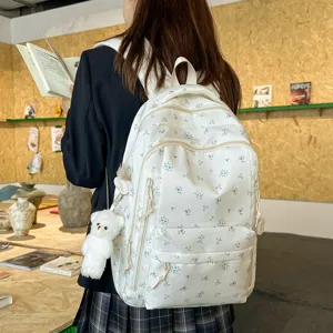 Chic floral canvas backpack for women and students, lightweight and cute casual daypack.