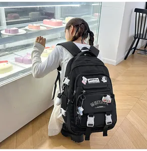 Large capacity black casual school backpack for students, daily commute and travel use.