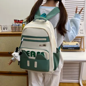 Detailed view of the casual canvas backpack with cute cat ears and front pocket design.