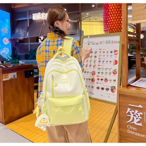 Detailed view of a cute color-matching canvas backpack for college students daily casual use.