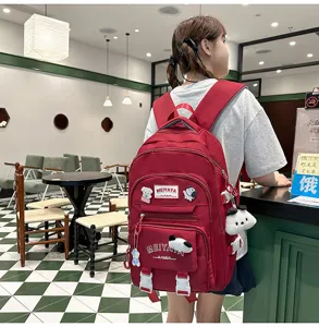 Large capacity student backpack, stylish red travel school bag with multi-pockets for daily use.
