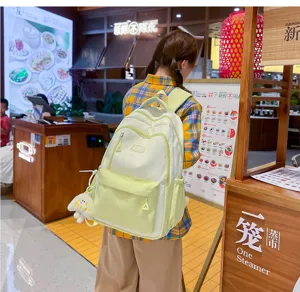 Detailed view of the stylish contrast color college backpack with large capacity for daily use.