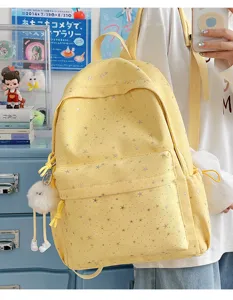 Yellow star print canvas backpack, chic school bookbag for teen girls, large capacity daypack.