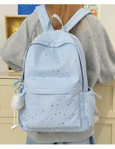 Light blue star pattern school backpack for women and students with cute plush ball pendant