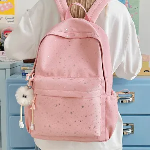 Pink star print backpack for women and girls, cute school bag with large capacity and fluffy charm.