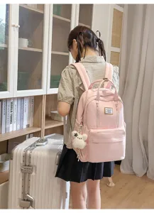Cute Japanese style pink school backpack for girls, large capacity casual travel daypack.