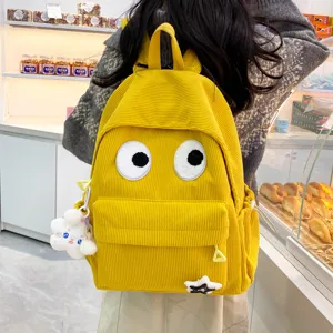 Cute yellow corduroy backpack with big eyes, casual large capacity school bag for women.