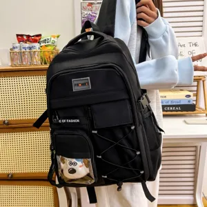 Black multi-pocket school backpack with clear front pocket and large capacity for students.