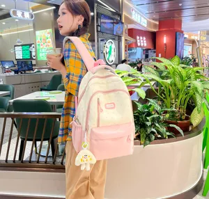 Detailed lifestyle view of the cute color-blocked casual backpack, showing large capacity.