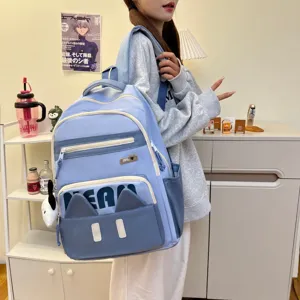 Casual light blue student backpack with cute cat ears design, spacious compartments and daily casual style.