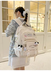 Canvas school backpack for students, large capacity computer travel bag with multiple pockets.