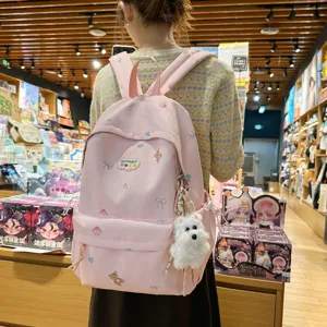 Cute pink cartoon bear print school backpack for teen girls, large capacity casual daypack.