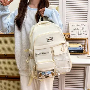 Off-white large capacity student backpack with multi-pockets, transparent window and cute toy.