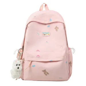 Pink cute cartoon bear print backpack for girls, large capacity school bookbag with plush dog pendant.