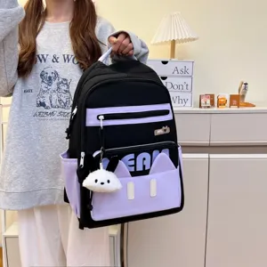 Casual Japanese style black and purple school backpack with cute plush bunny pendant for daily use.