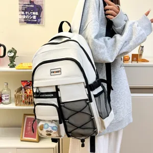 Large capacity white school backpack for daily use with multiple pockets and stylish patch.