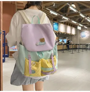 Dopamine color-block backpack for students, large capacity casual sweet schoolbag.