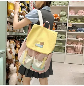 Colorblock casual backpack for teen girls, sweet style school bag with cute bear patch.
