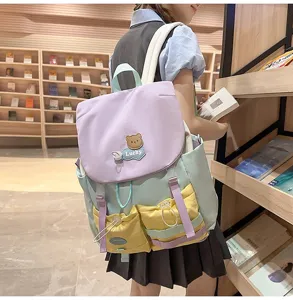 Detail view of colorful student schoolbag, large capacity casual backpack with sweet style.