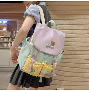 Dopamine color-blocked backpack for teenage girls, large capacity casual school bag.