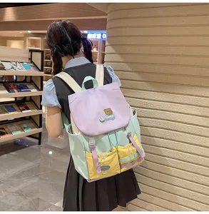 Dopamine color-blocking backpack for students, large capacity sweet style school bag.