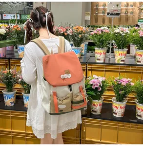 Dopamine contrast color canvas school backpack with cute bear patch for students casual travel.