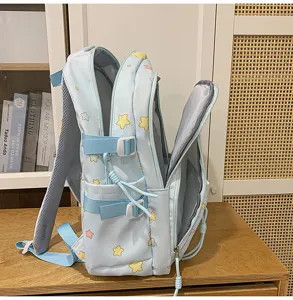 Close-up view of the sweet star print backpack showing side straps and zipper pocket details.