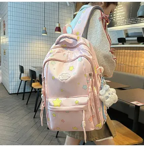 Pink star print school backpack with cute pendant, sweet style casual daypack for teens.