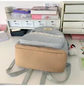 Casual blue khaki colorblock school backpack with floral stripe for daily commute and students.