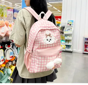 Cute pink plaid school backpack for girls, large capacity student casual daypack with dog design.