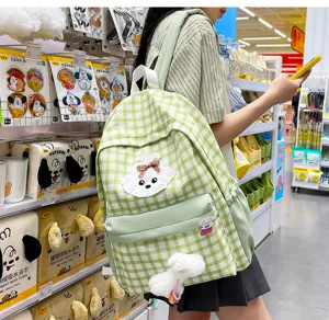 Green and white plaid backpack for women, cute puppy plush design, large capacity school bag.