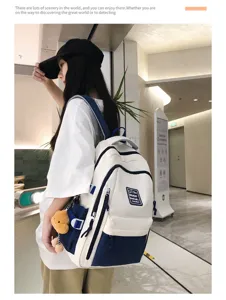 Casual colorblock student backpack scene detail, spacious daily travel daypack display.