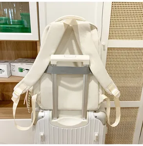 Mochila de color sólido con correa para maleta, bolsa escolar informal y mochila diaria.
