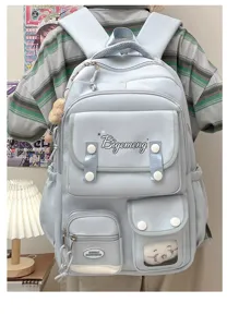 Casual college style light blue backpack detail, multi-pocket design with cute pendant.