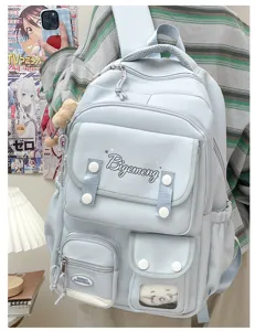 Light blue casual college school backpack with multi pockets and cute charm for students travel.