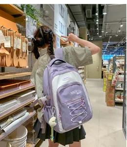 Detail view of the stylish color block student backpack with large capacity and multi pockets.