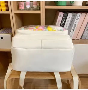 Mochila escolar de color sólido con bolsillo frontal transparente, gran capacidad.