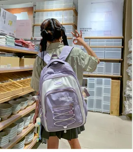 Stylish contrast color large capacity school backpack for girls, trendy Korean style design.