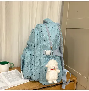 Japanese style sweet bow print casual backpack for women, cute school bookbag with plush.