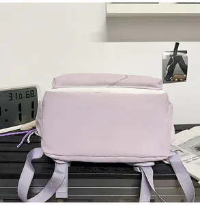 Casual minimalist grey purple backpack detail view, ideal for daily use and school travel.