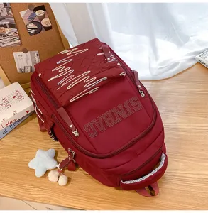 Large capacity solid color casual backpack, lightweight student school bag with stylish design.