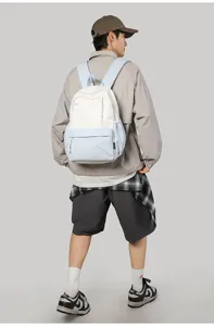 Casual minimalist large capacity backpack for university students, stylish color block.