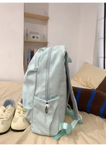 Cute bow embroidered student backpack, casual travel daypack for teens and girls.