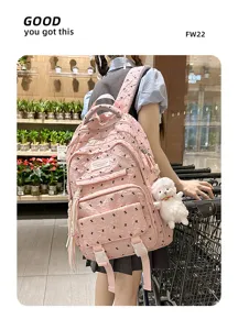 Casual pink backpack for women and students, large capacity cute school book bag daily travel.
