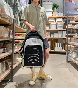 Large capacity contrast color student backpack, stylish Korean design daily school bag.