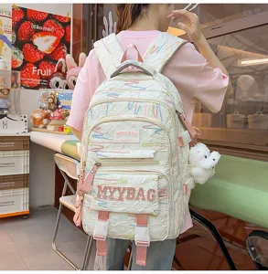 Large capacity student backpack with colorful abstract lines and cute pendant details stylish.