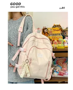 Cute pink backpack for women, large capacity casual school bookbag with cute embroidery.