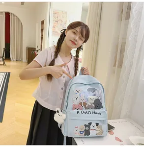Detailed view of the cute blue canvas backpack with fun animal doodle prints and sweet style.